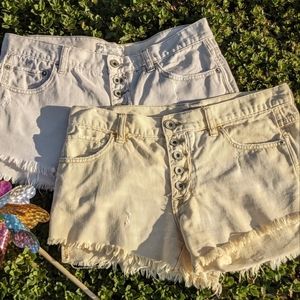 Free People button fly distressed shorts. Waist: 32". Pair (1 yellow& 1 off-wht)